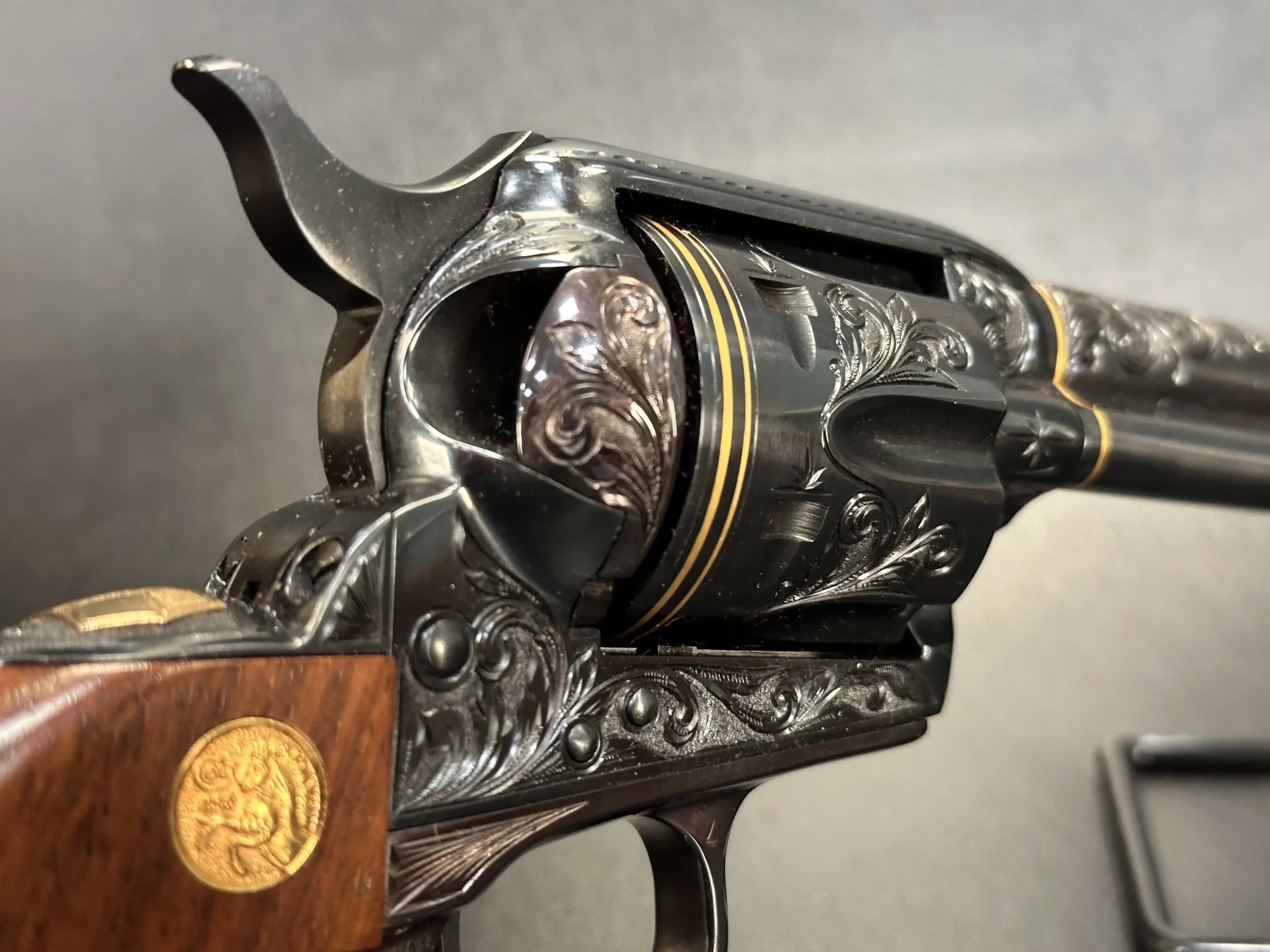 Colt SAA engraved revolvers deep scroll engraving