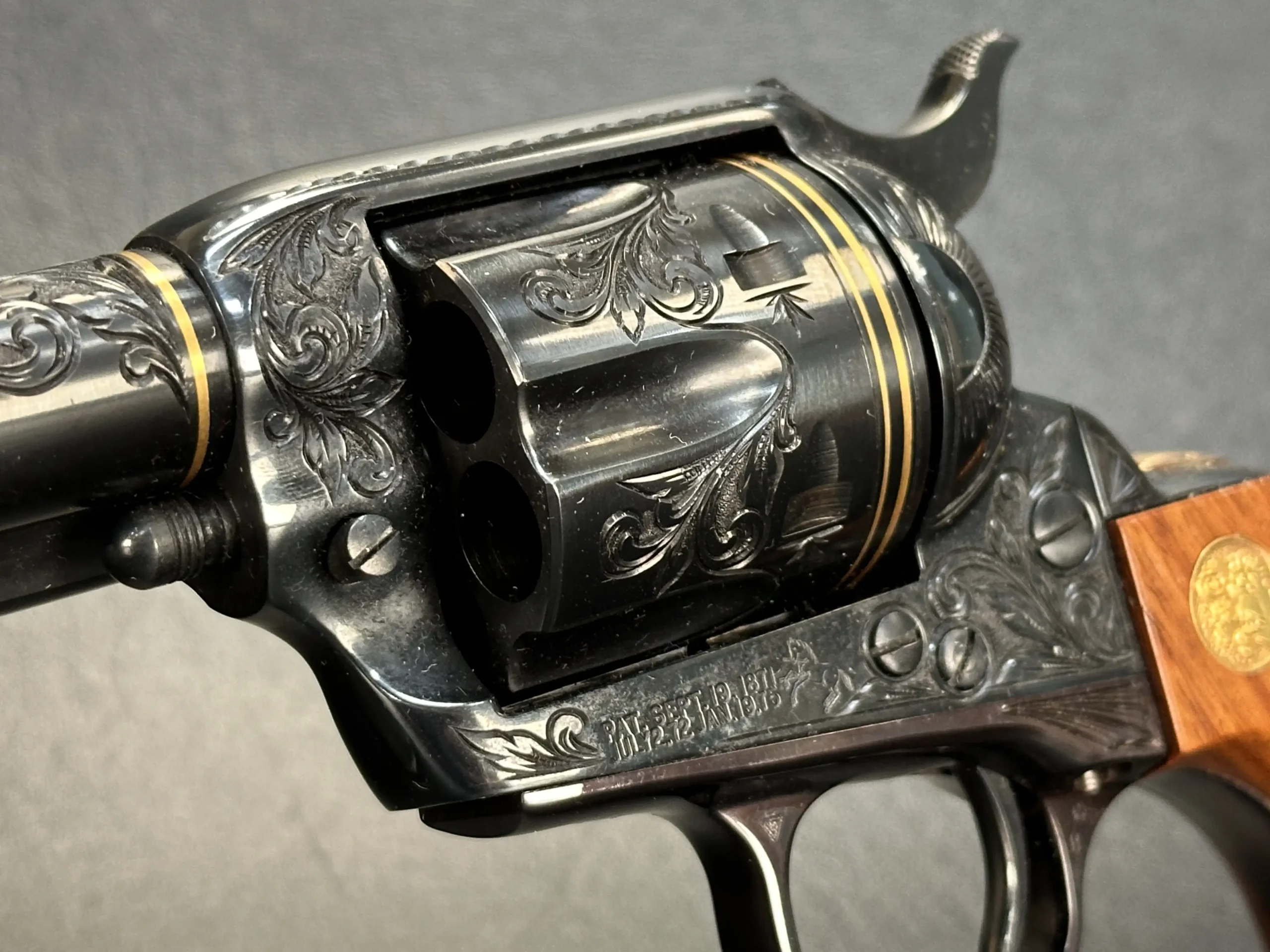 Colt SAA engraved scroll revolvers matched pair