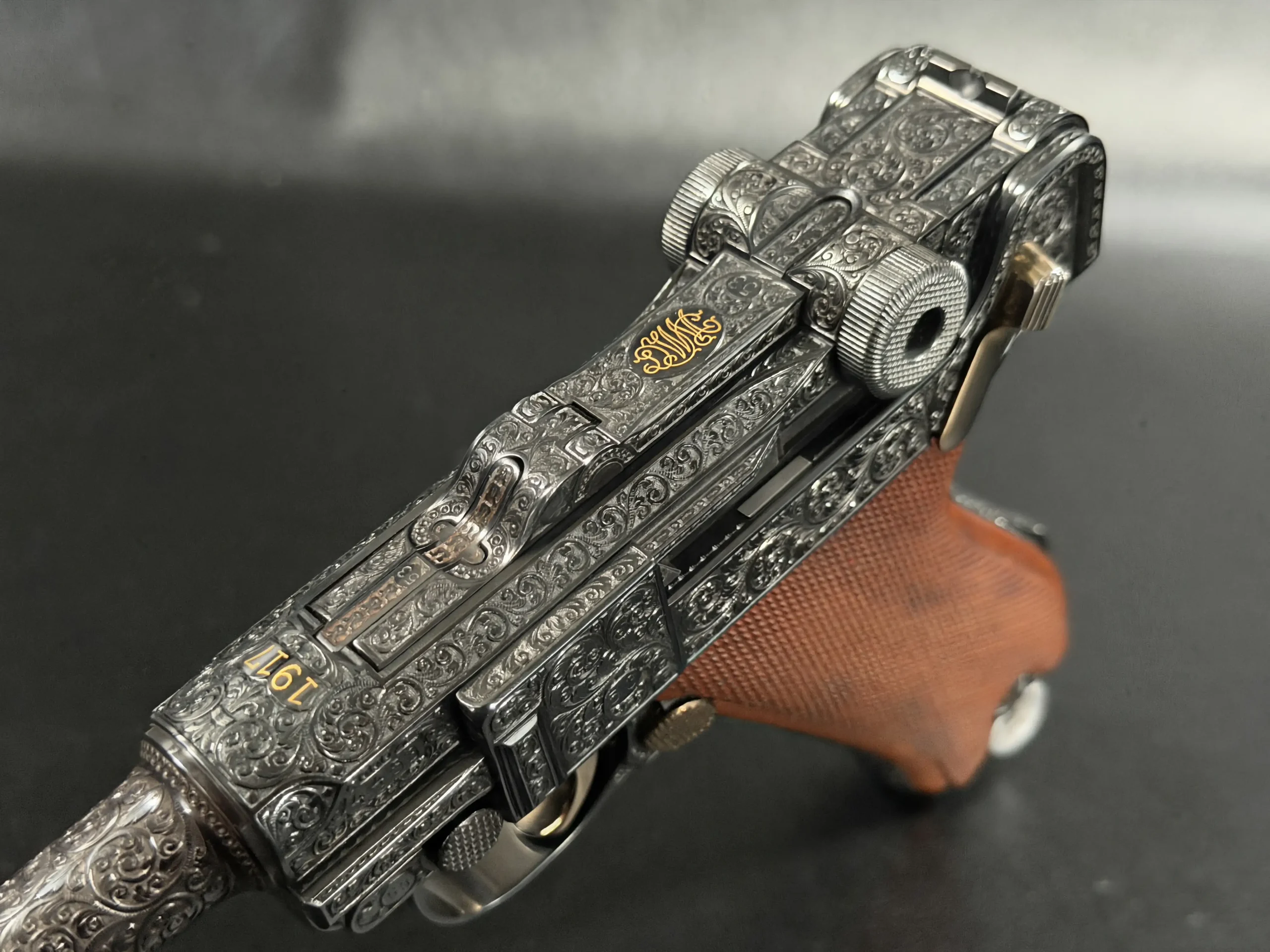Engraved Luger P08 grip frame detail