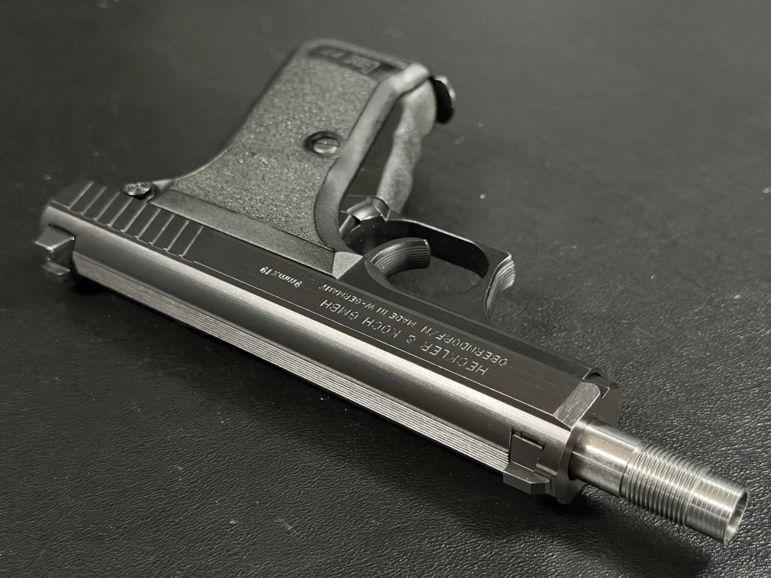 HK P7SD suppressor host pistol