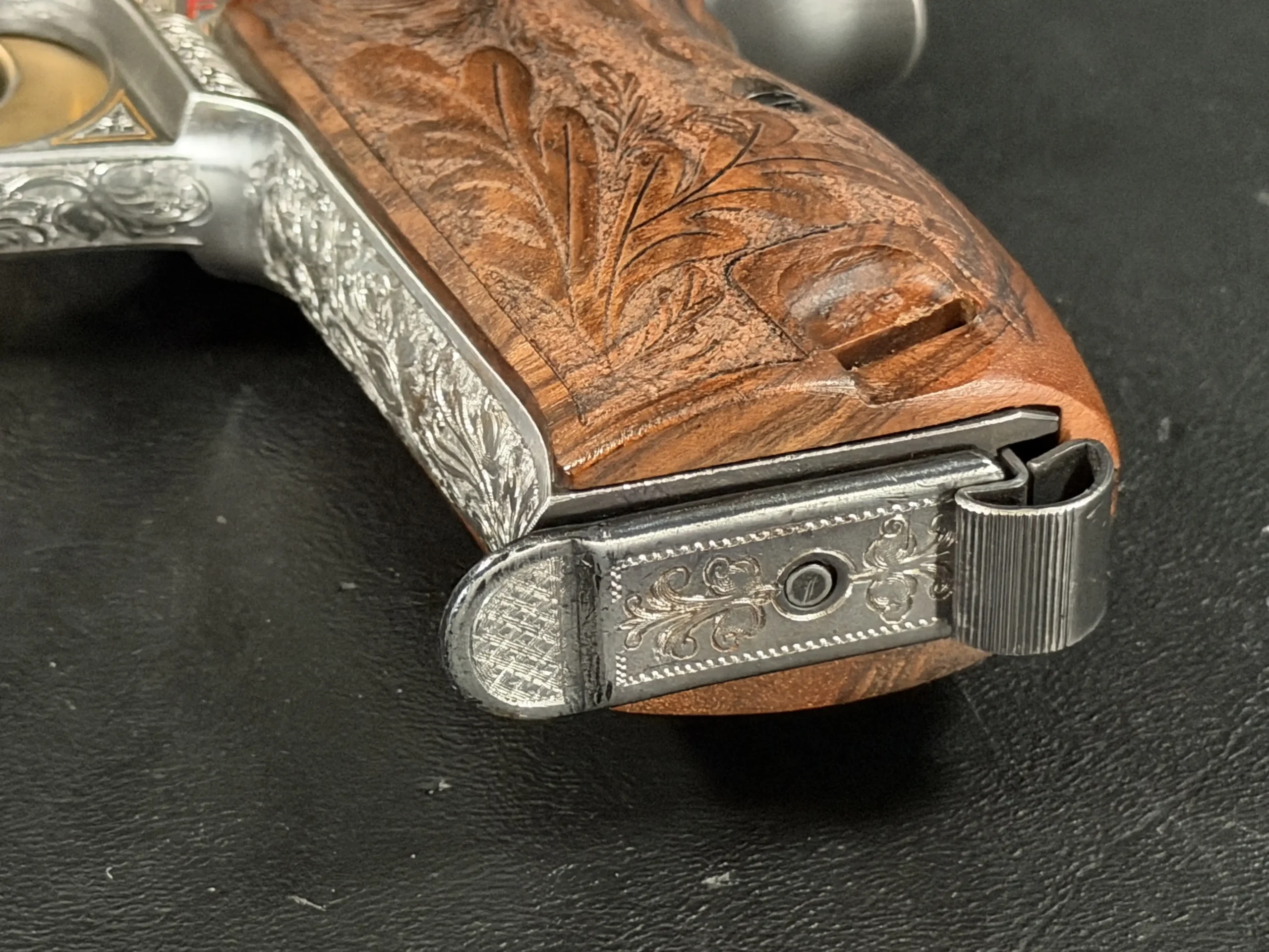 SIG P210 engraved pistol Swiss precision luxury