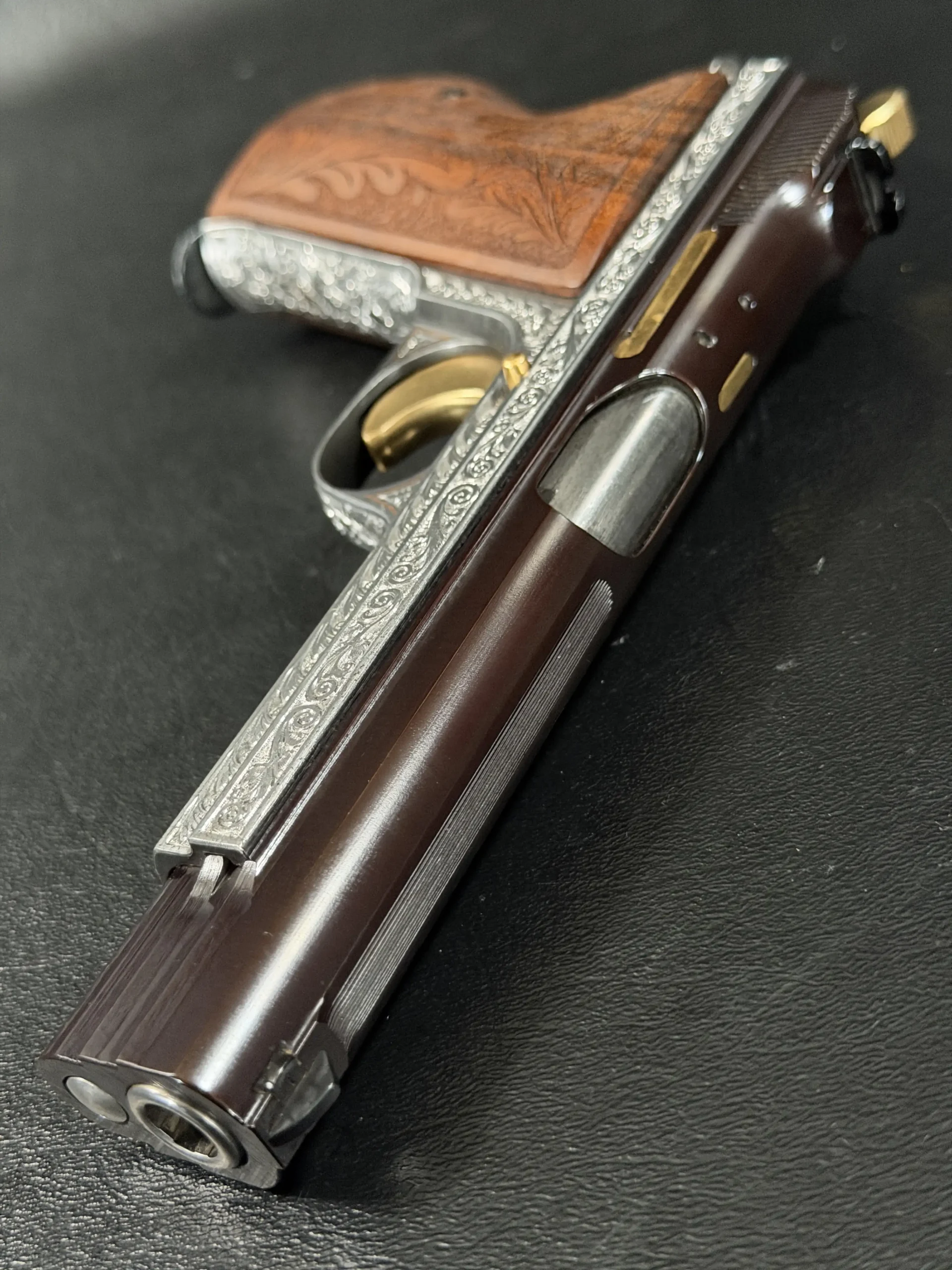 SIG P210 engraved pistol classic Swiss craftsmanship