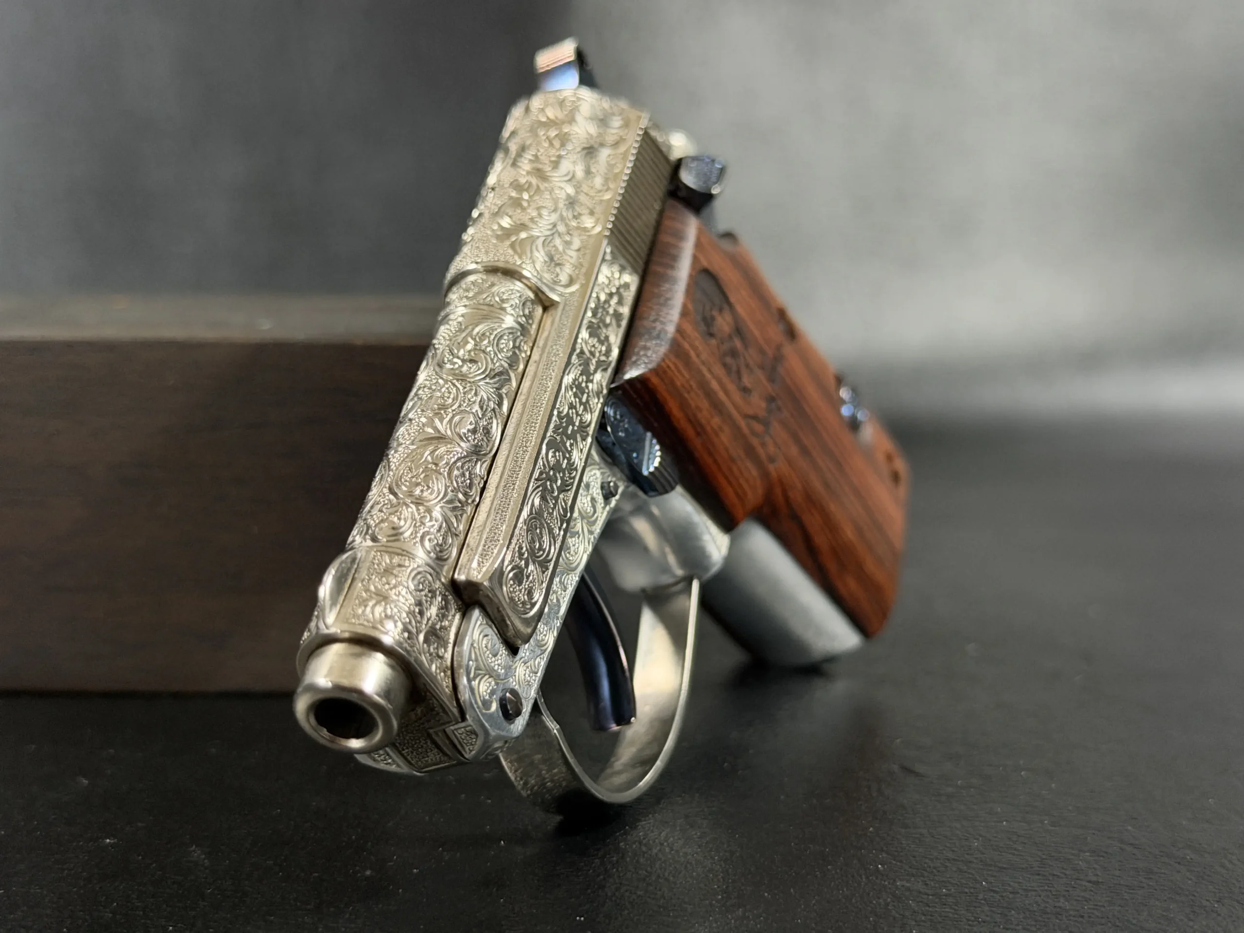 Beretta 21A Bobcat silver engraved scroll