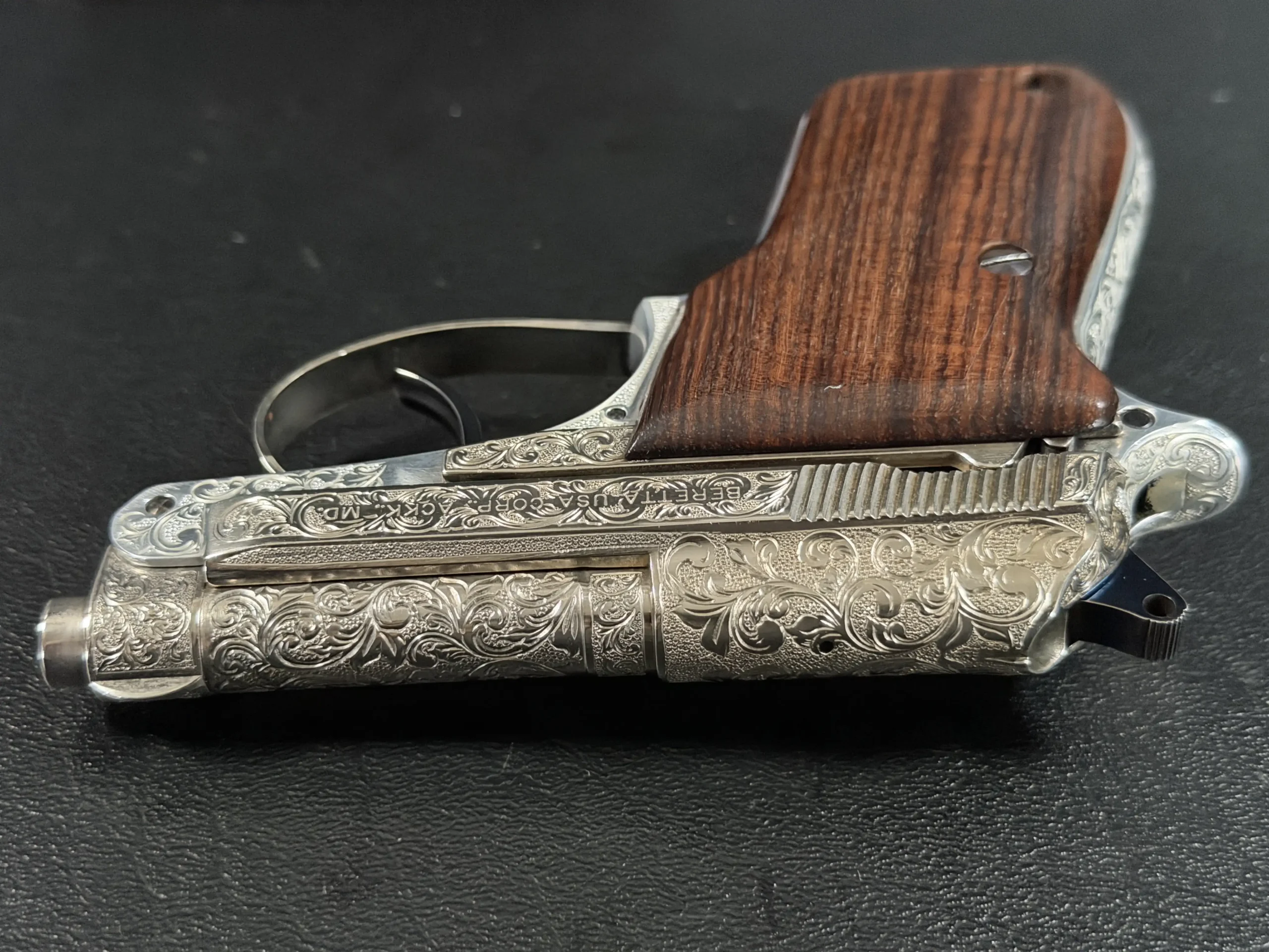 Beretta 21A tip up barrel engraved model